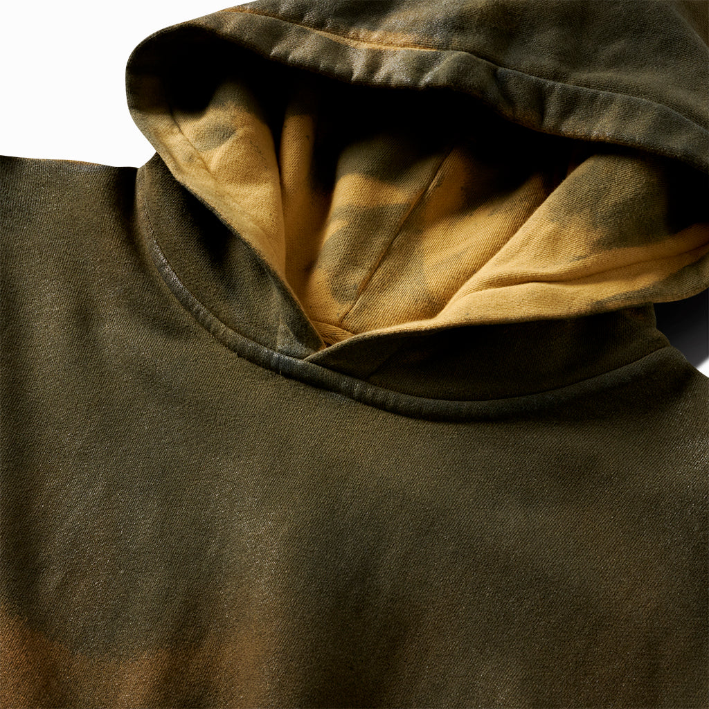 Close-up of the leatherized hoodie's hood with orange-stained lining