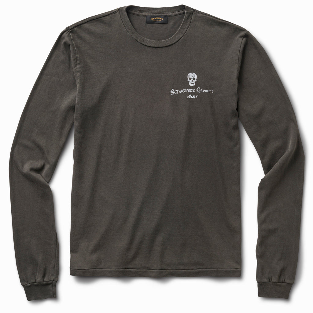 Charcoal grey long sleeve tee, front view, with a small skull and script chest logo