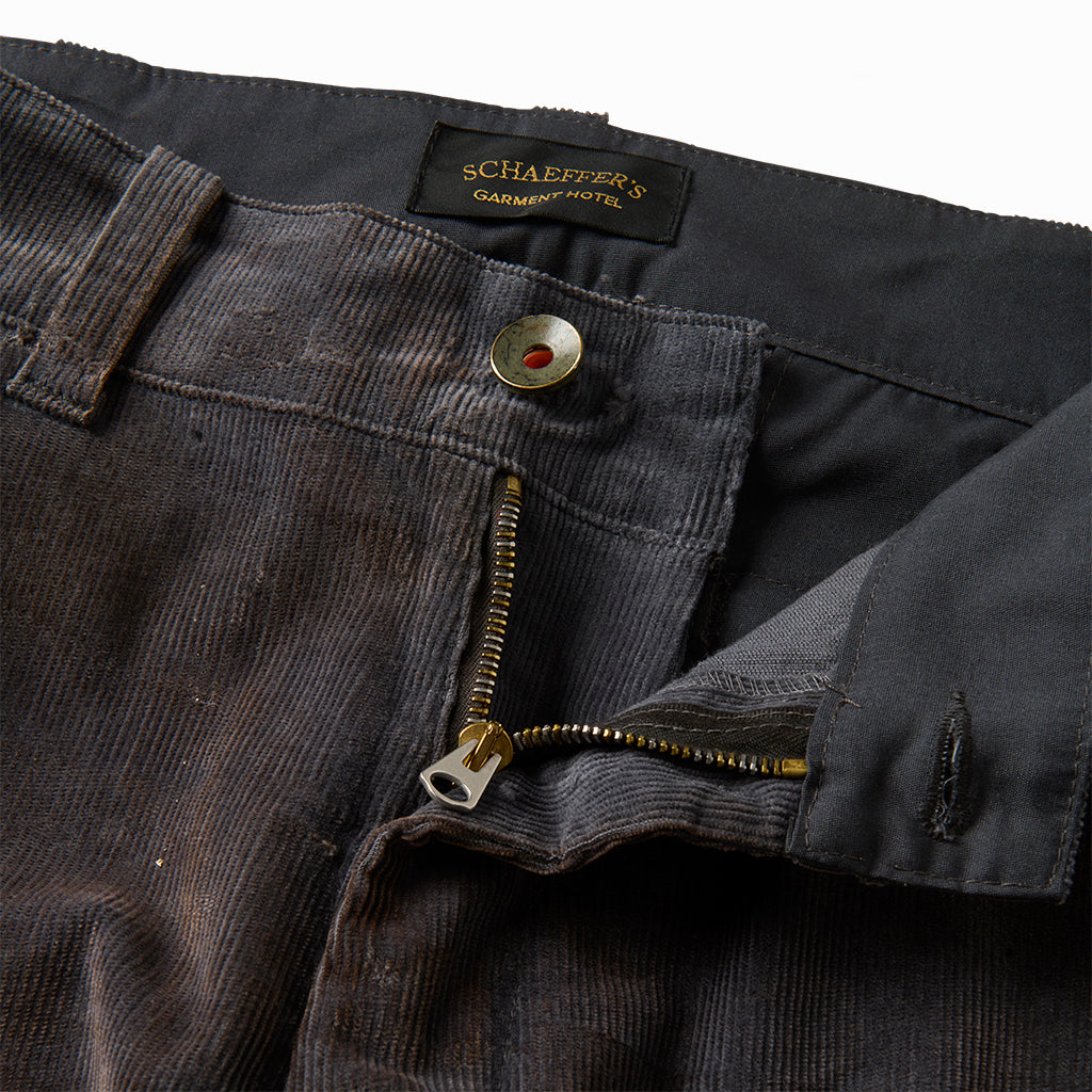 Close-up of the corduroy chino's zip fly, button and Schaeffer's label