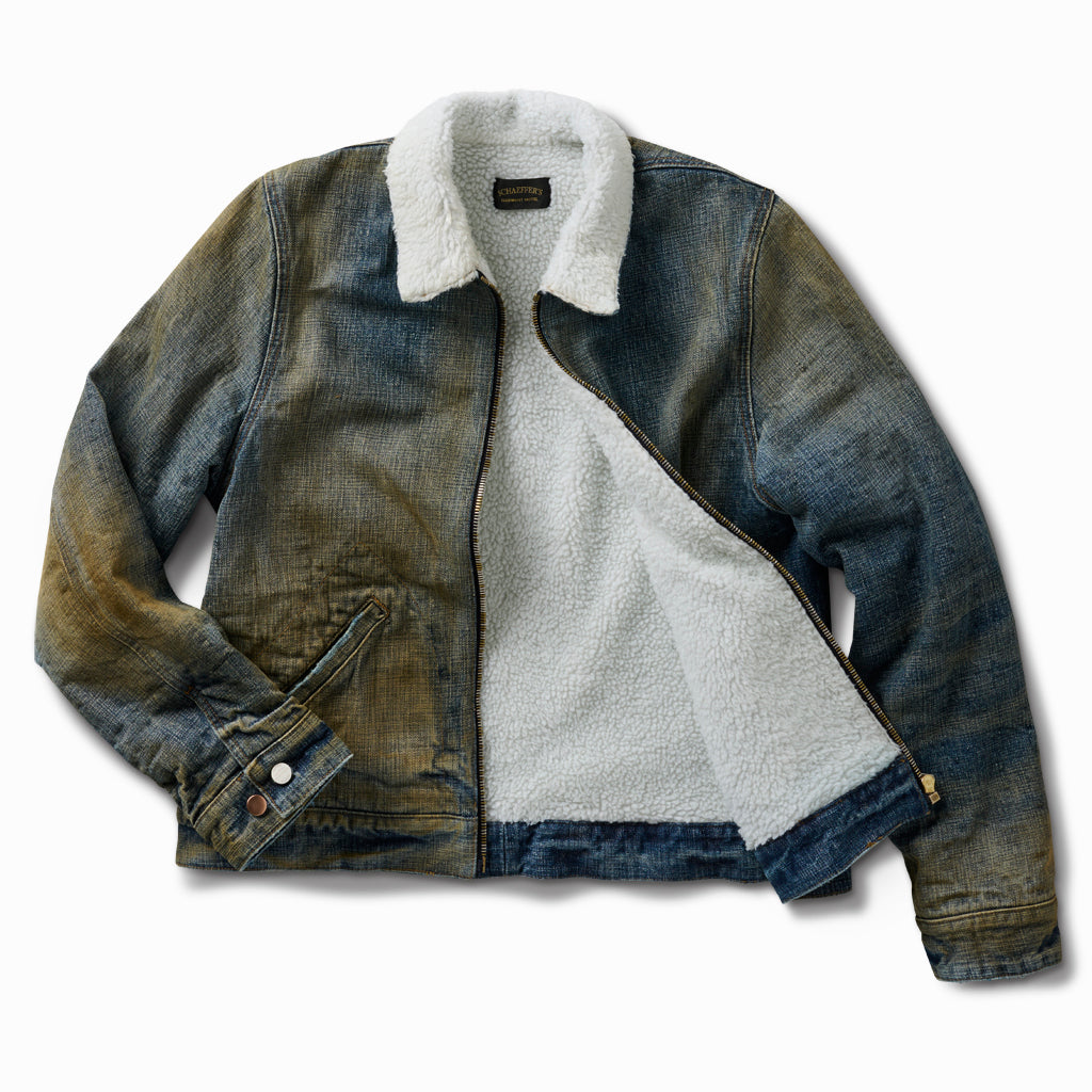 Shearling denim jacket shown open to reveal the white shearling lining