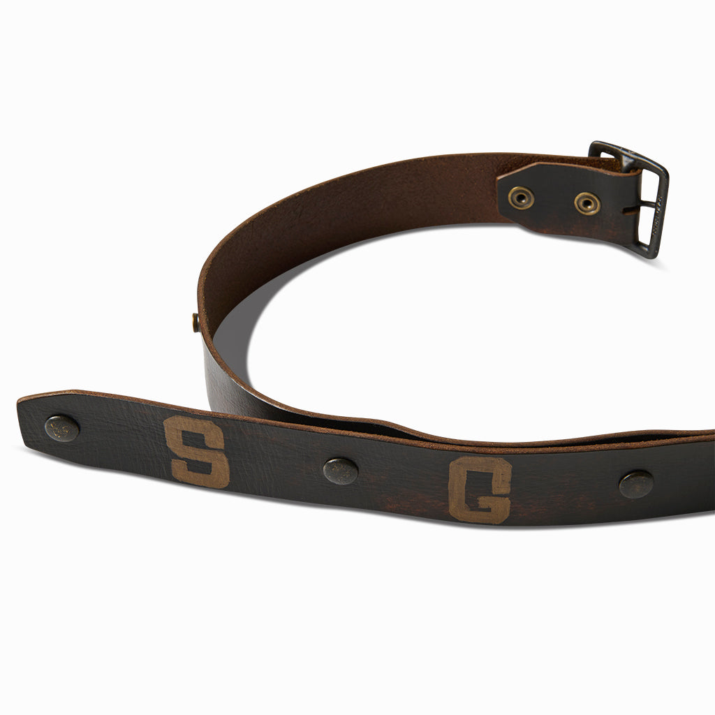 Black leather SGH belt curved to show the buckle end