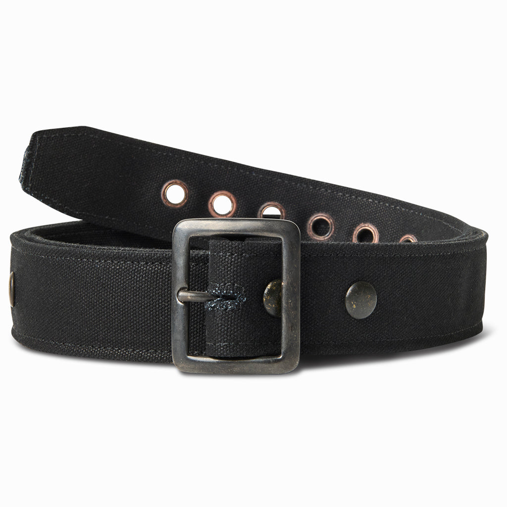 Black canvas 50s grommet belt with a gunmetal roller buckle and copper grommets