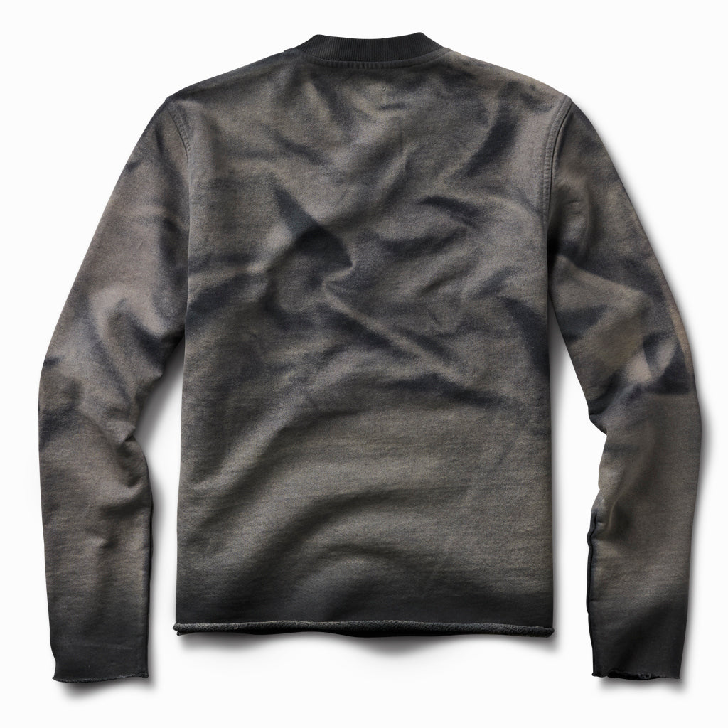 Oil-stained crew sweatshirt, back view