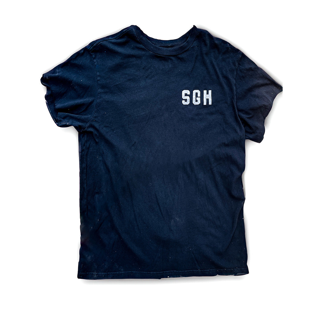 Front of the navy collaboration tee with a small white SGH chest print