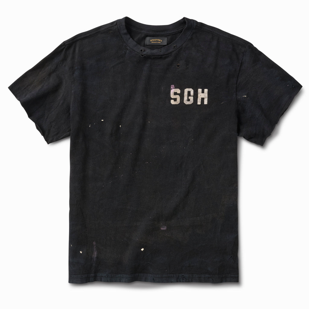 Distressed black raw sleeve tee, front view, with a faded white SGH chest print and paint flecks