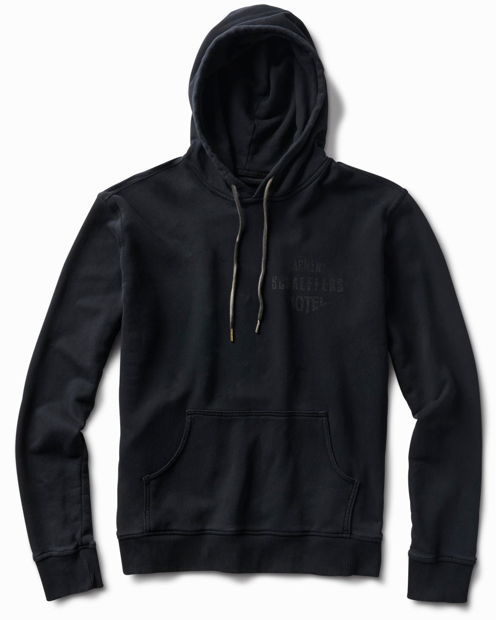 Black Ghost Logo pullover hoodie, front view, with a tonal black Schaeffer's Garment Hotel chest print
