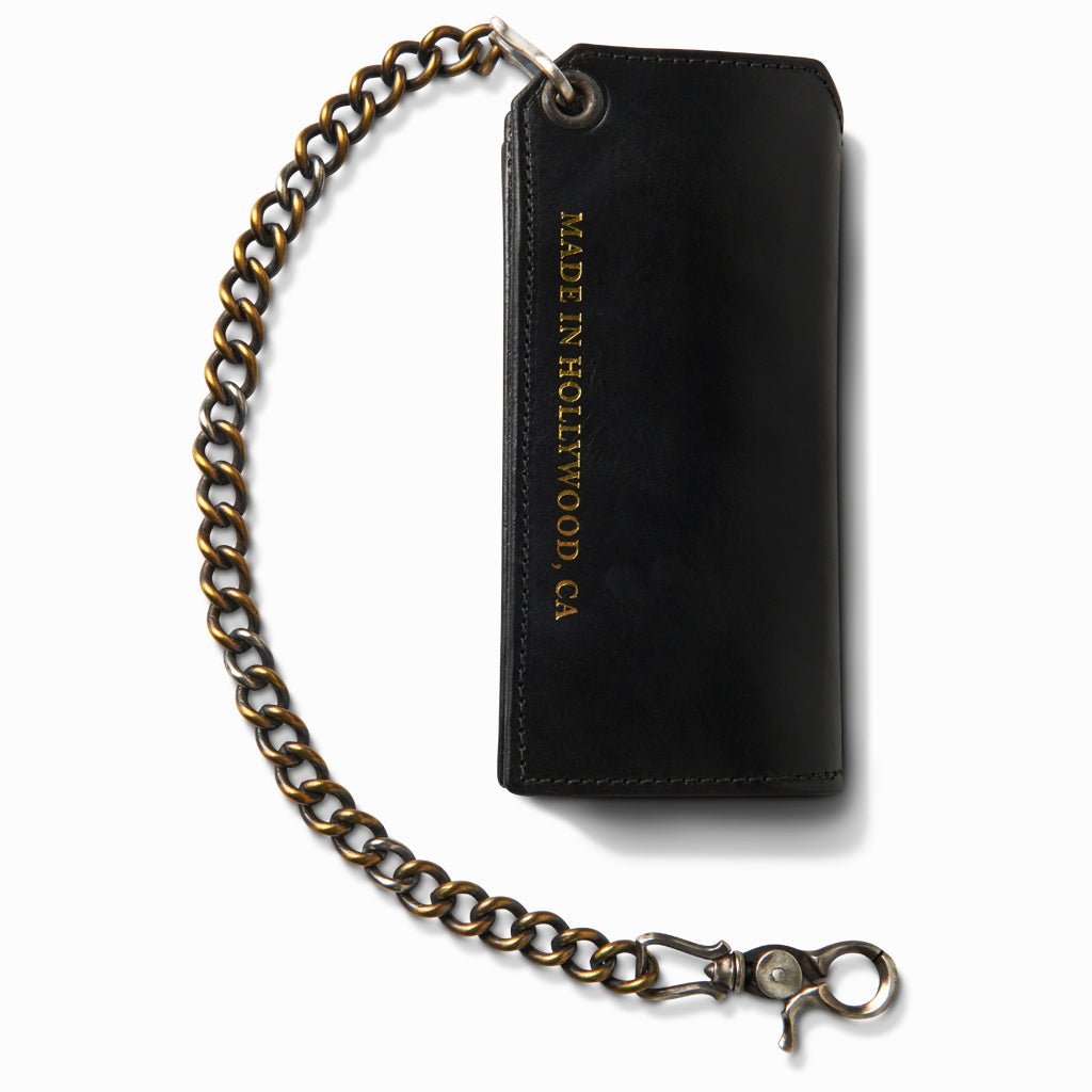 Back of the black horsehide wallet stamped Made in Hollywood, CA, with brass chain