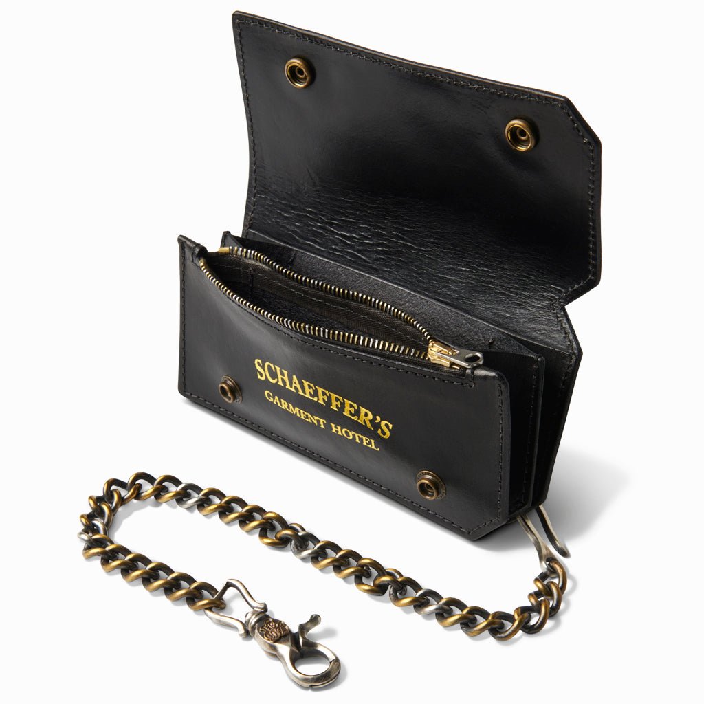 Black horsehide wallet open to show a zip coin pocket and gold Schaeffer's Garment Hotel stamp