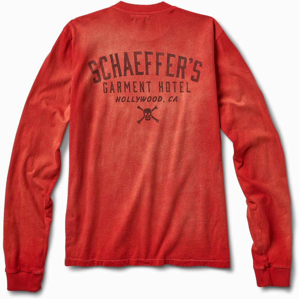 Faded red sun long sleeve tee, back view, with a Schaeffer's Garment Hotel Hollywood, CA skull and crossbones print