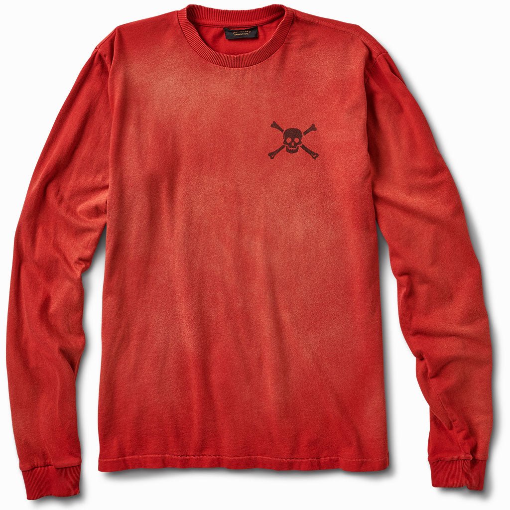 Faded red long sleeve tee, front view, with a small skull and crossbones on the chest